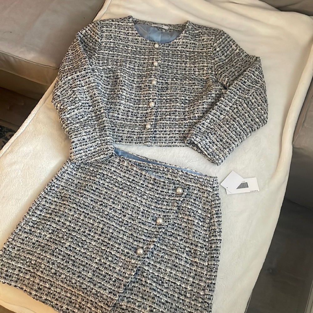 Baby blue plaid jacket/skirt set. In brand new condition with tags. Size XXL.